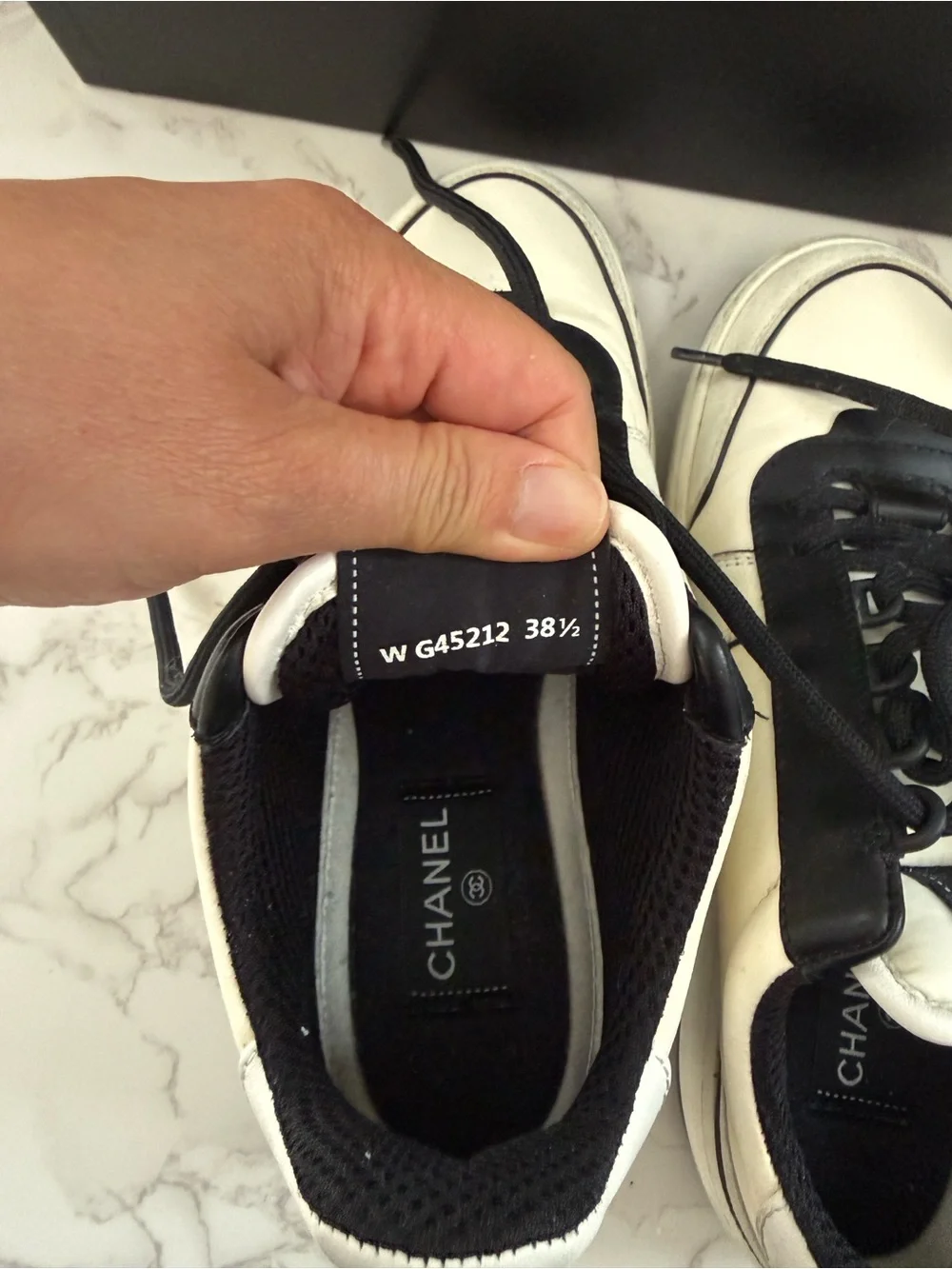 CHANEL Leather Cream and Black CC Charm Low-Top Sneakers